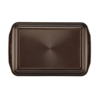 Experience the perfect blend of durability and functionality with our 9" x 13" Nonstick Rectangular Cake Pan, featuring a brown finish and convenient handles to meet all your baking needs.