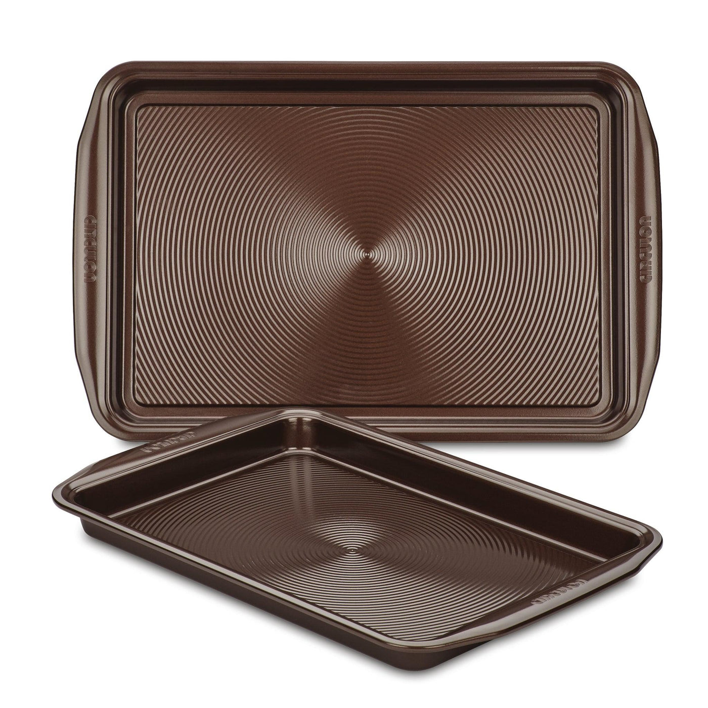 A set of two brown non-stick cookie pans, made from heavy gauge steel with textured surfaces, ensuring their oven safety and durability.