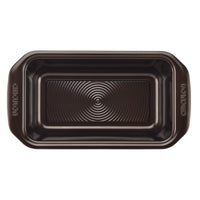 High-quality nonstick 9" x 5" bakeware loaf pan with a textured surface and easy-to-grip handles.