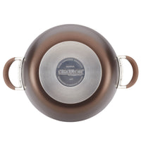 A top view highlights the *5.5-Quart Nonstick Casserole*, crafted from heavy-duty hard-anodized aluminum and featuring two brown handles on either side, ideal for preparing one-pot meals.