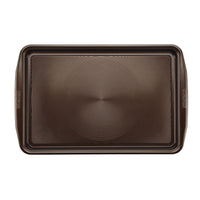 The Nonstick Cookie Pan is a rectangular option featuring a textured surface and handles, making it oven safe for all your baking needs.
