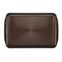2-piece 10"x15" nonstick cookie pan set with concentric circle pattern.