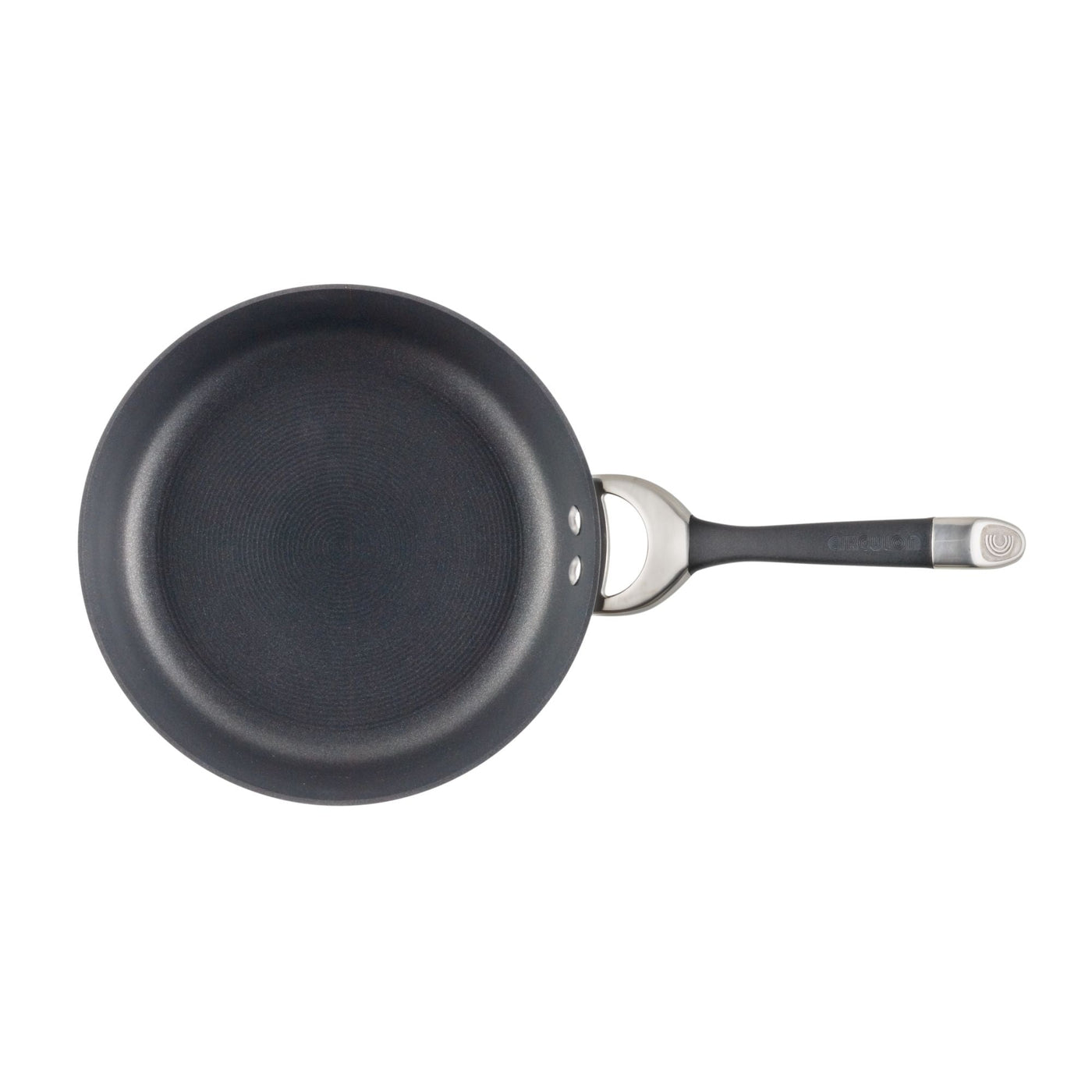 A hard-anodized frying pan with a black finish and metal handle, featuring a nonstick system, displayed on a white background.