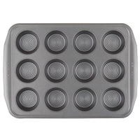 A top-view of a 12-cup Nonstick Muffin Pan that is oven-safe.